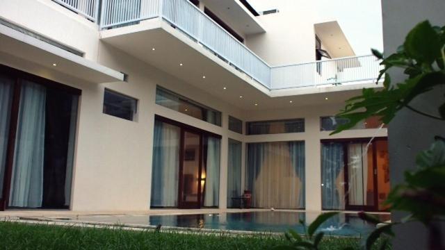 Pasific Beach Cottages Mangsit Zimmer foto