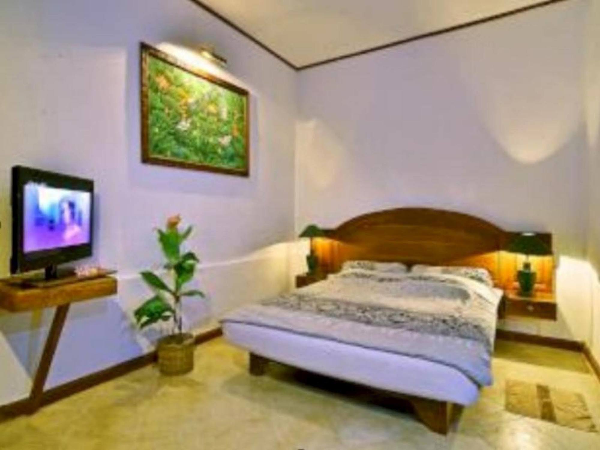 Pasific Beach Cottages Mangsit Exterior foto