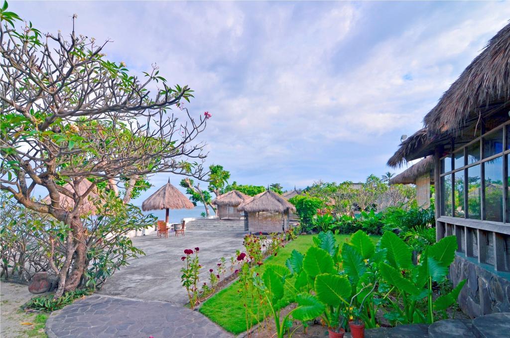 Pasific Beach Cottages Mangsit Exterior foto